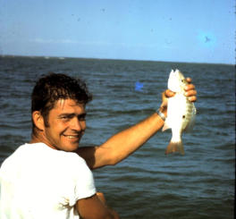 Joel Thompson with a snapper; Key West 1970