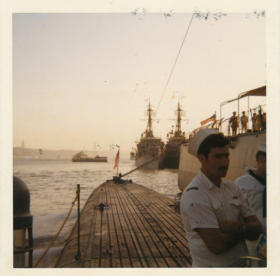Still running the battery charge at Lisbon (sunset) 1970 (the skimmer officers look thrilled)